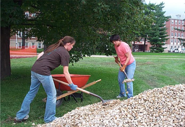 Student installing rock (Fall 2006)