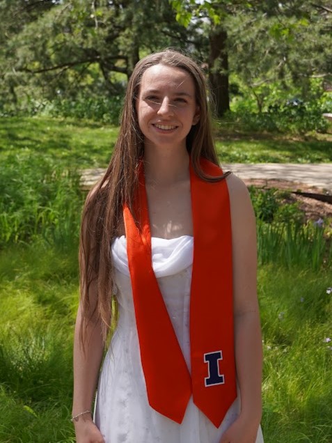 Chantal Korde poses for a photo at RORG in her Illinois graduation attire.