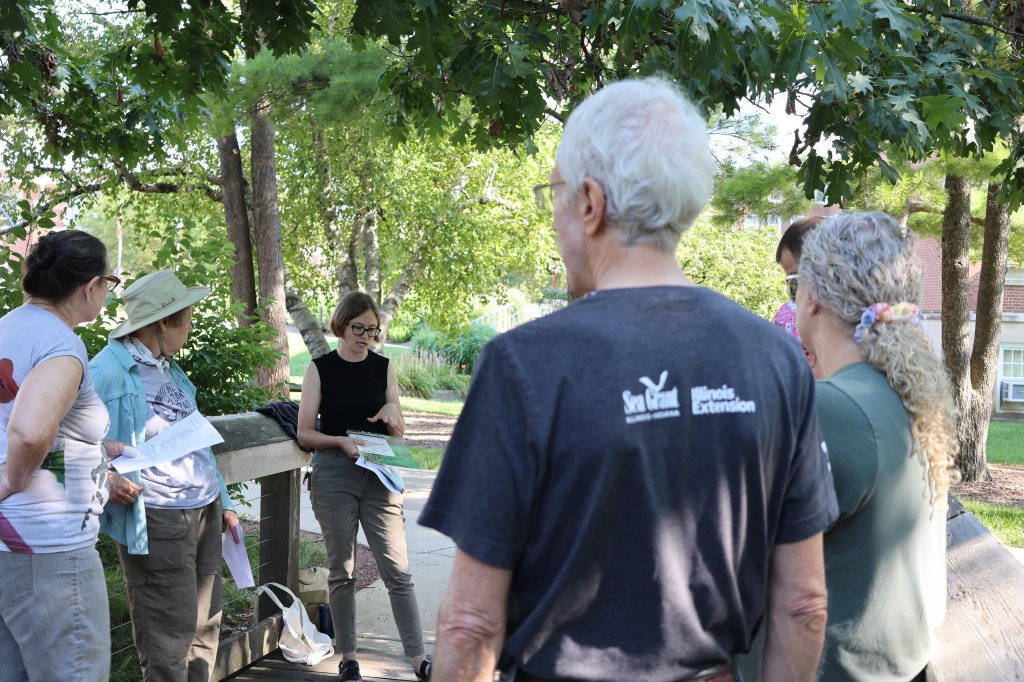 Landscape Architect Bridgette Moen talks to RORG volunteers during a mini-lesson on the history of campus trees.