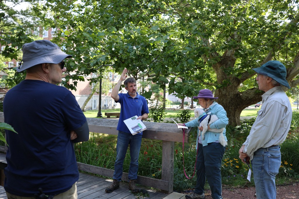 Horticulture Educator Ryan Pankau talks to RORG volunteers during a mini-lesson on trees.